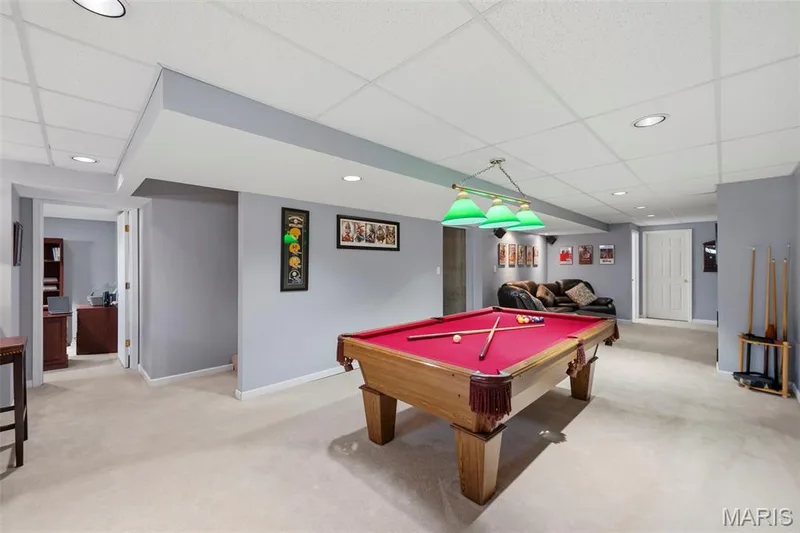 Expansive finished lower level offers plenty of space for entertaining. — 2 Emmons Court #1294, O'Fallon, MO 63368