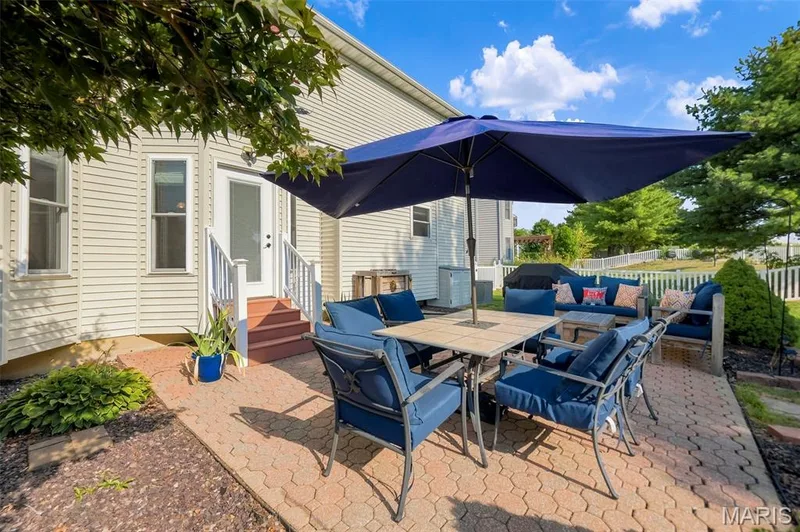 Steps down from the breakfast room to your dream patio — 2 Emmons Court #1294, O'Fallon, MO 63368