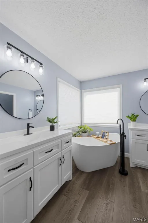 Double vanity and corner windows for extra natural light — 2 Emmons Court #1294, O'Fallon, MO 63368