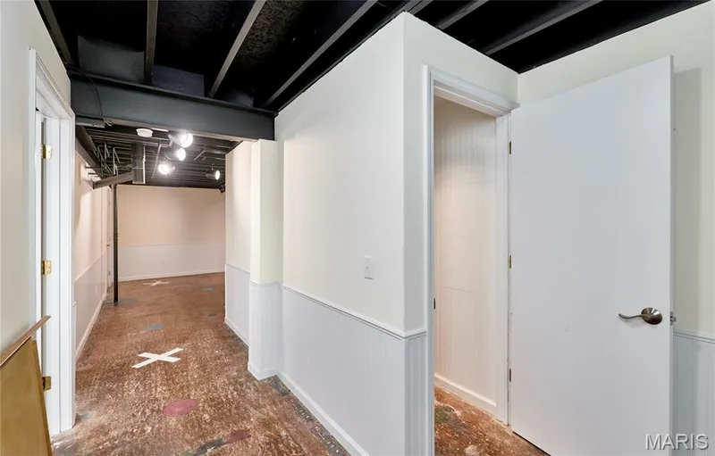 Exposed ceiling joists, recessed lighting fixtures, white paneling — 146 Old Buggy Court #A, St Charles, MO 63304