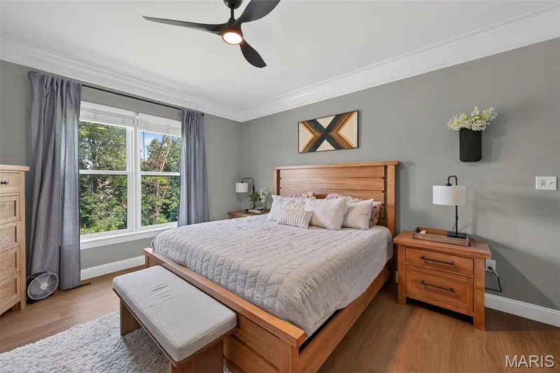Primary Bedroom with Luxury Vinyl Plank Flooring and 9 Foot Ceilings — 517 Stonewolf Creek Drive, Wentzville, MO 63385