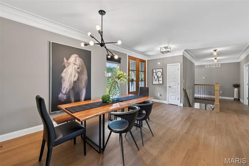 Dining Area with 9 Foot Ceilings and Luxury Vinyl Plank Flooring — 517 Stonewolf Creek Drive, Wentzville, MO 63385