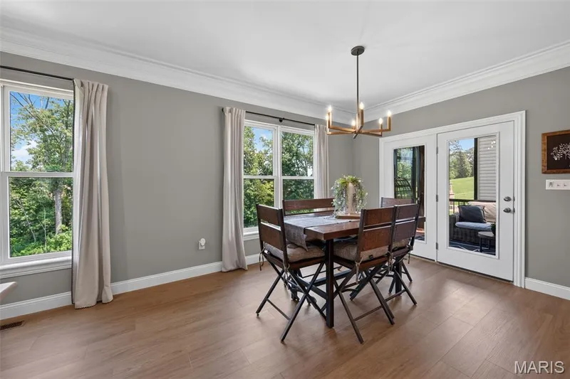 Breakfast Room that Opens up to a Screened-In Deck — 517 Stonewolf Creek Drive, Wentzville, MO 63385