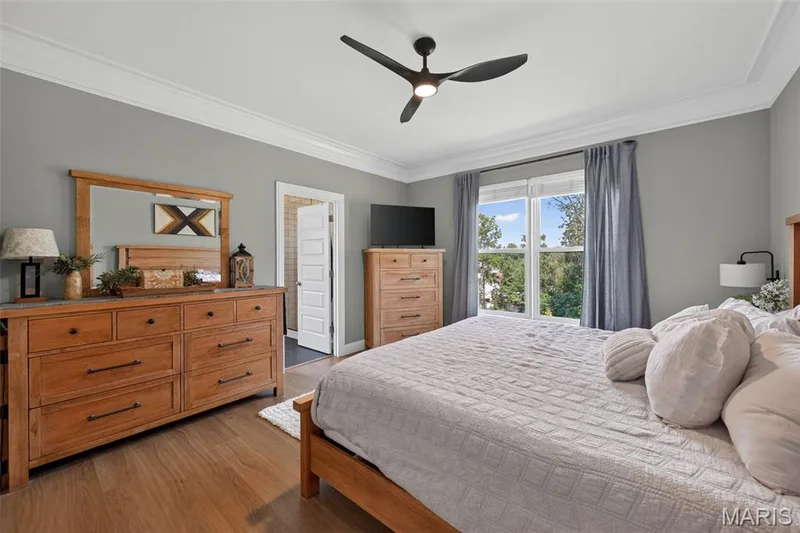 Primary Bedroom with Luxury Vinyl Plank Flooring — 517 Stonewolf Creek Drive, Wentzville, MO 63385