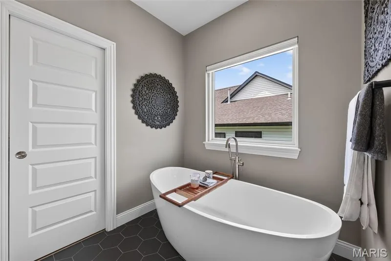 Free Standing Soaking Tub in the Primary Bathroom — 517 Stonewolf Creek Drive, Wentzville, MO 63385