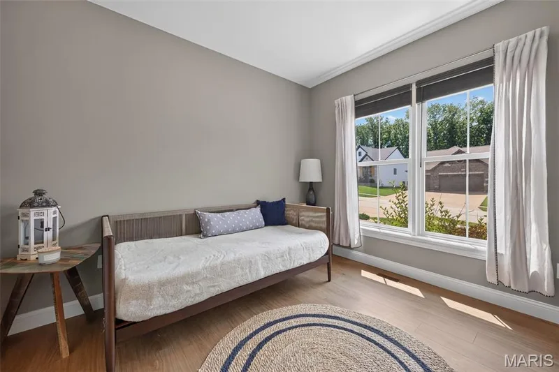 Secondary Bedroom with Luxury Vinyl Plank Flooring — 517 Stonewolf Creek Drive, Wentzville, MO 63385