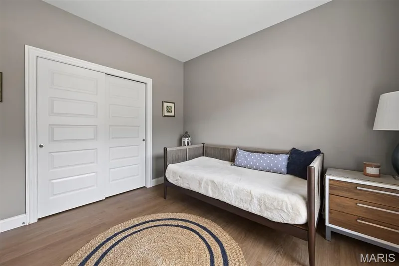 Secondary Bedroom with Luxury Vinyl Plank Flooring — 517 Stonewolf Creek Drive, Wentzville, MO 63385