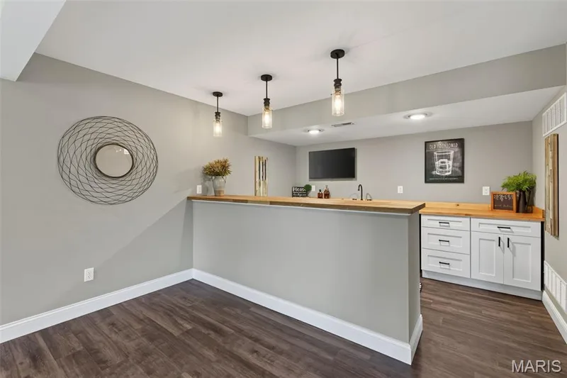 Wet Bar in the Finished Lower Level — 517 Stonewolf Creek Drive, Wentzville, MO 63385