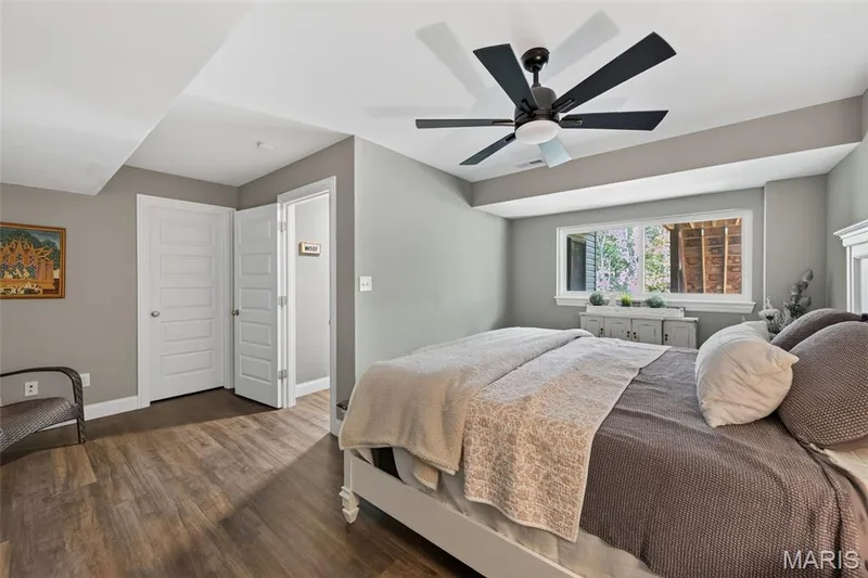 Bedroom with Egress Window and a Walk In Closet in the Finished Lower Level — 517 Stonewolf Creek Drive, Wentzville, MO 63385