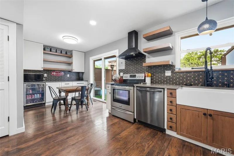 This kitchen has so many clever updates that you do not usually tind at this price point. The range vent is the first — 13473 Coliseum Drive, Chesterfield, MO 63017
