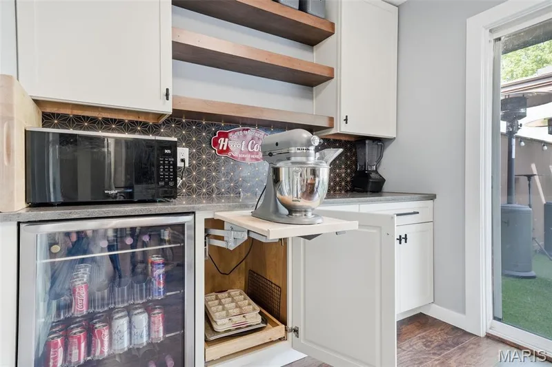 Another handy feature. The mixer lift cabinet elimates carrying the mixer around or storing it on the countertop. Just lift up with the mixer already on it. You're ready to go! — 13473 Coliseum Drive, Chesterfield, MO 63017