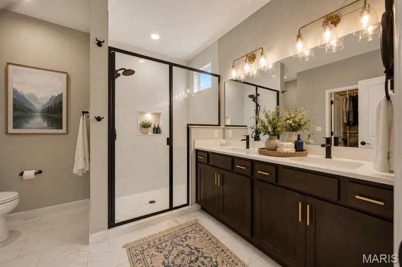 Primary bathroom with double bowl adult height sinks, large shower — 204 Randlin Drive, Lake St. Louis, MO 63367