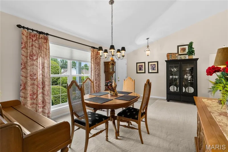 Formal Dining room looking into foyer — 8 Autumn Grove Court, O'Fallon, MO 63366