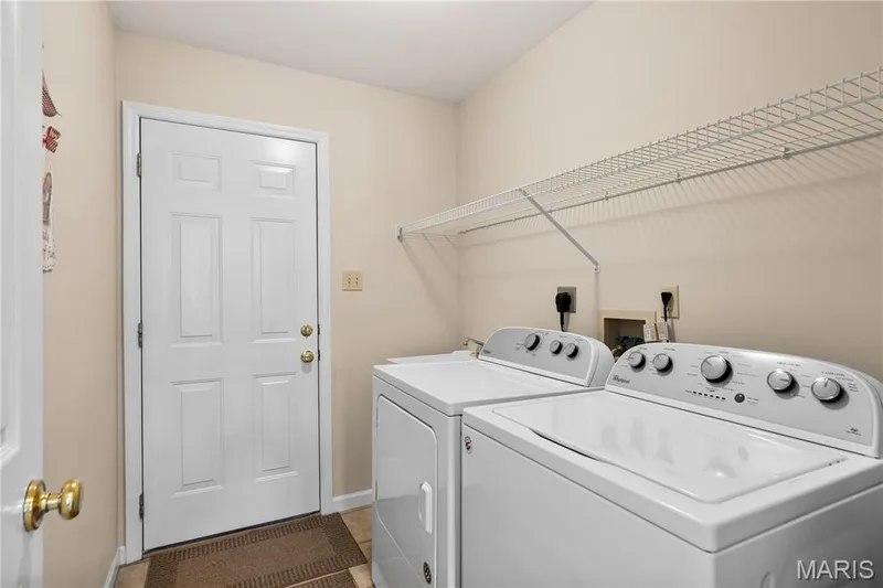 First floor laundry with laundry tub — 8 Autumn Grove Court, O'Fallon, MO 63366