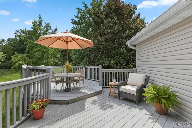 Virtually staged deck looking out in to yard — 8 Autumn Grove Court, O'Fallon, MO 63366