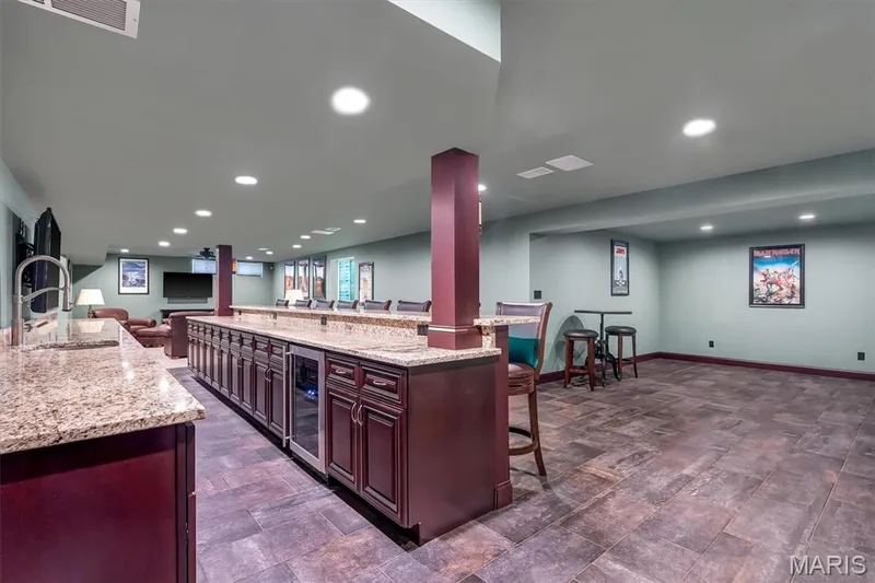 18 foot granite bar with additional space for gaming — 11090 Stonebridge Lane, Wentzville, MO 63385