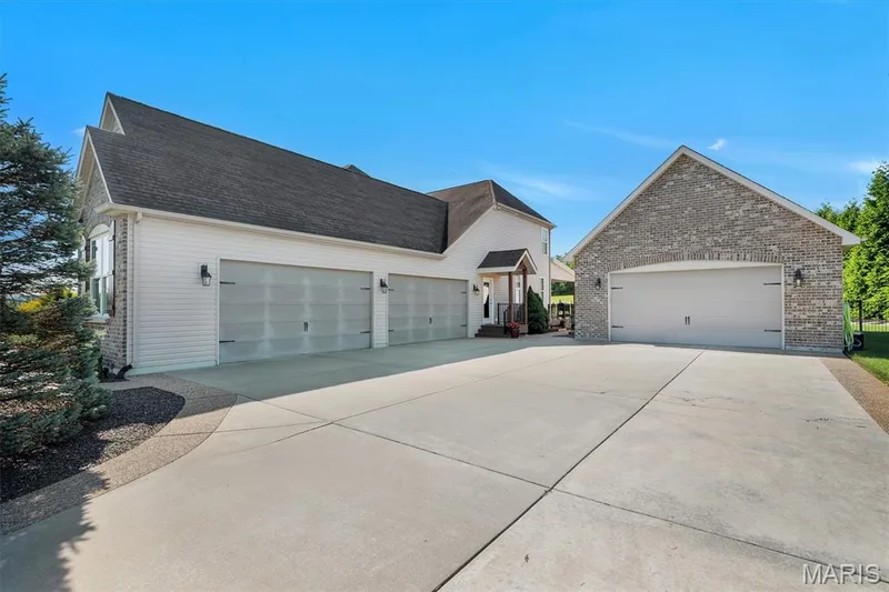 View of Both Garages — 11090 Stonebridge Lane, Wentzville, MO 63385