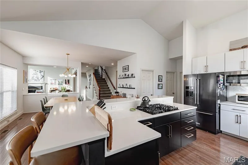 kitchen open to the breakfast room — 11 Orchard Trace Lane, Wildwood, MO 63040