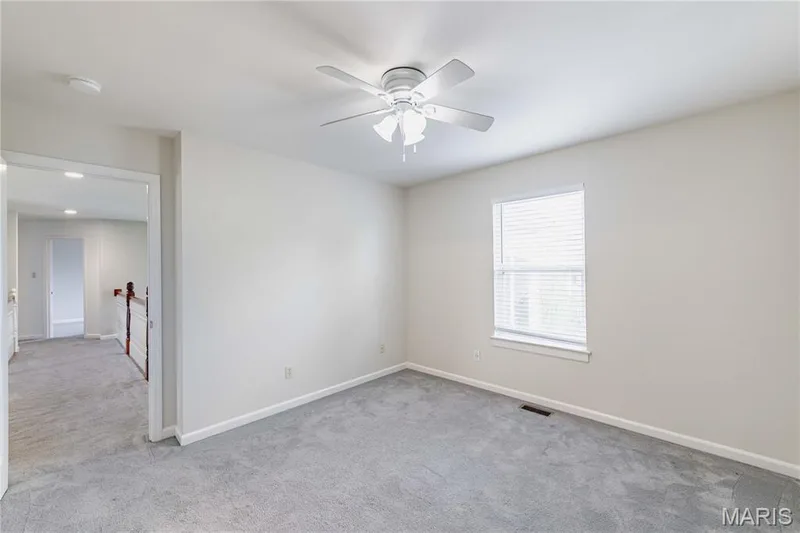 upper level bedroom #1 with walk in closet and ensuite bath — 11 Orchard Trace Lane, Wildwood, MO 63040