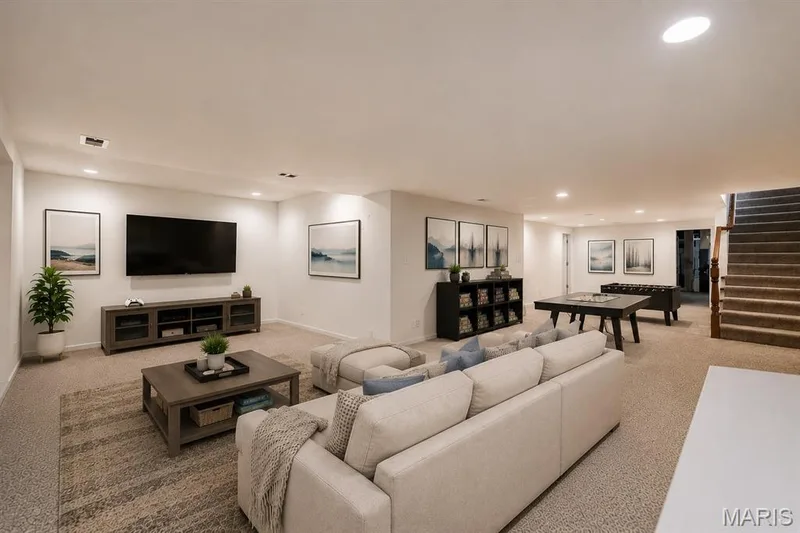finished lower level with bar/kitchenette area — 11 Orchard Trace Lane, Wildwood, MO 63040