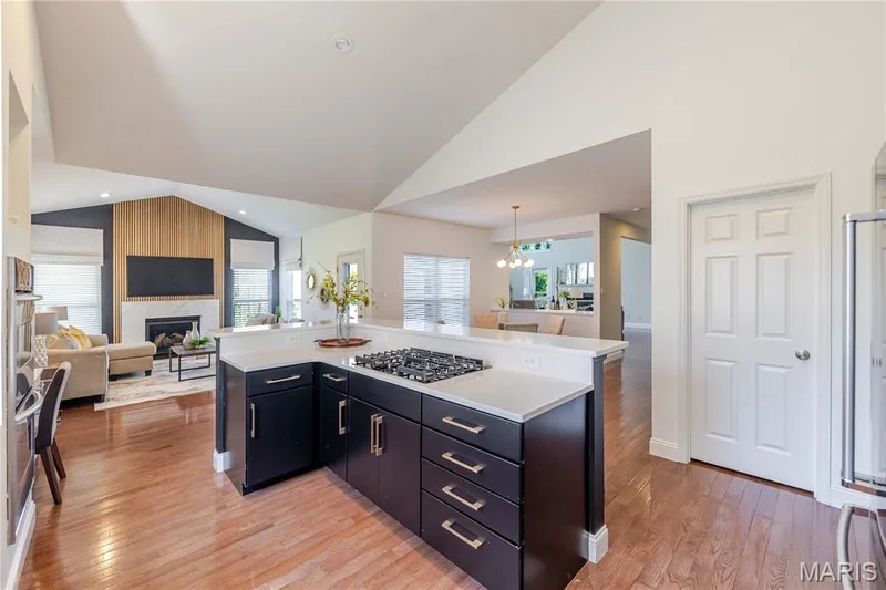 Great eat in island open to the hearth room, breakfast room and great room beyond — 11 Orchard Trace Lane, Wildwood, MO 63040