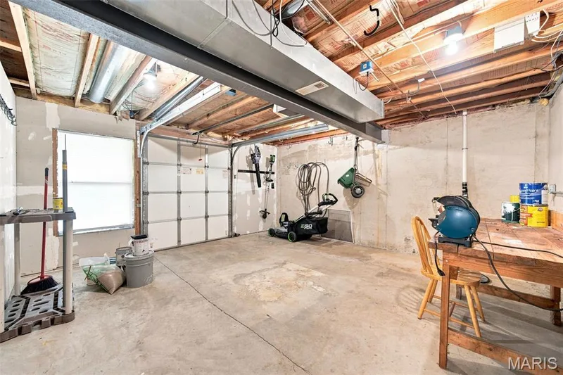 Lower level Golf Cart Garage — 752 Hawk Run Drive, O'Fallon, MO 63368