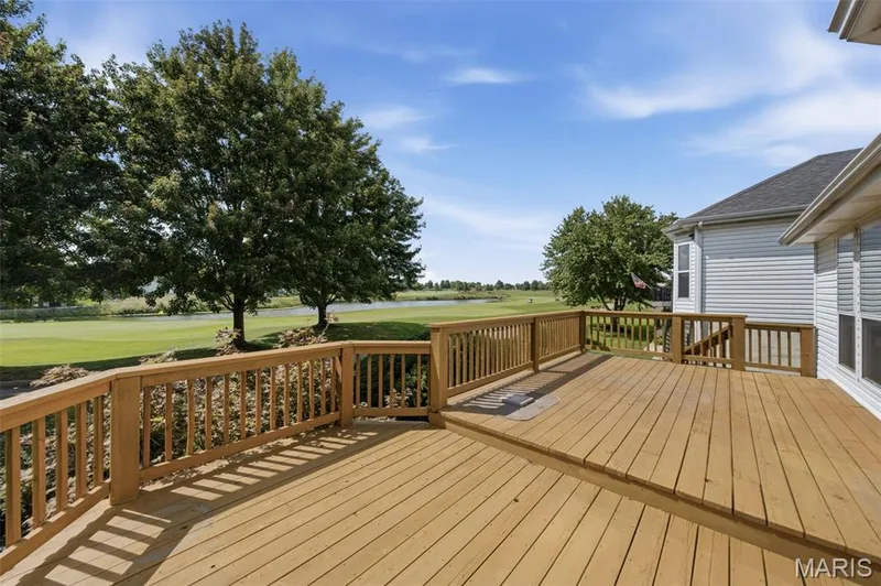 Lower level Golf Cart Garage door to the exterior rear yard — 752 Hawk Run Drive, O'Fallon, MO 63368