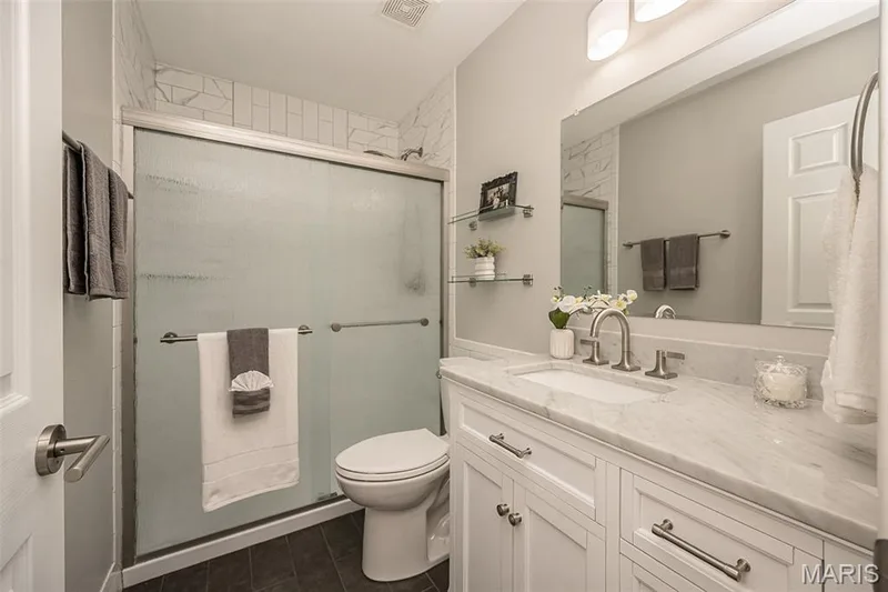 Updated main floor hall bath boasts walk in shower, adult height vanity & quartz counters! — 842 Braefield Court, Chesterfield, MO 63017