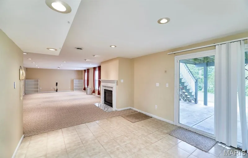 massive recreation room with fireplace and walkout — 1516 Hibernation Hollow, Wentzville, MO 63385