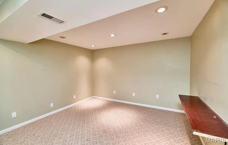 this office/bonus room is located in the lower level — 1516 Hibernation Hollow, Wentzville, MO 63385