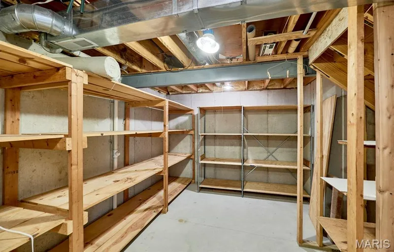1 of 2 storage areas located in the lower level — 1516 Hibernation Hollow, Wentzville, MO 63385