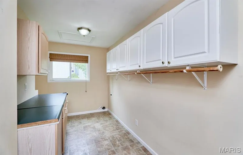 large laundry room — 1516 Hibernation Hollow, Wentzville, MO 63385