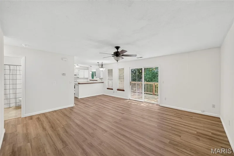 Main Living Area with Luxury Vinyl Plank Flooring — 1044 Sugar Creek Court #5, St Peters, MO 63376