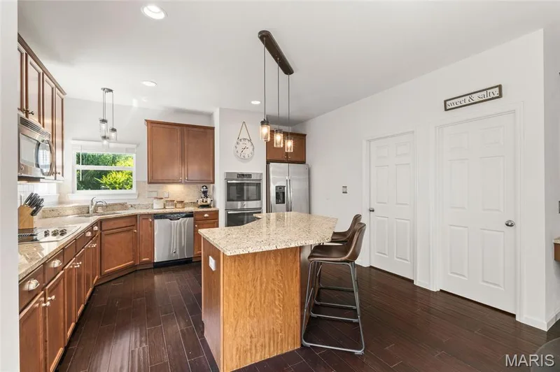 Walk-in Pantry with several shelves and hooks! — 921 Molloy Drive, O'Fallon, MO 63366