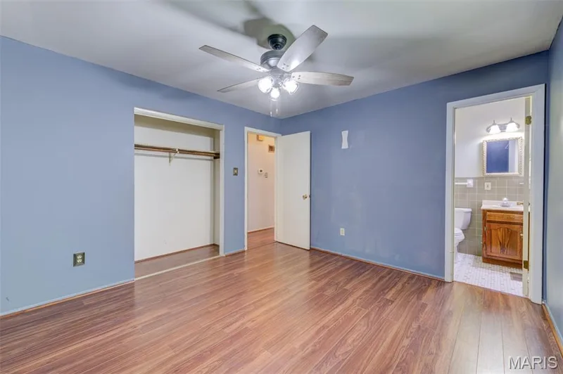 Primary bedroom with 1/2 bath and double-door closet. — 3357 Glendale Avenue, St Charles, MO 63301