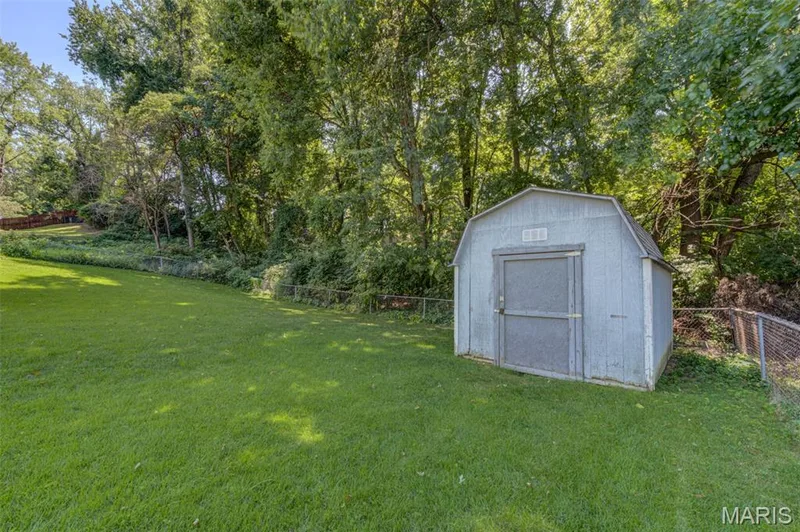 The fenced rear yard has a shed for you lawn implements that will stay with the home. — 3357 Glendale Avenue, St Charles, MO 63301