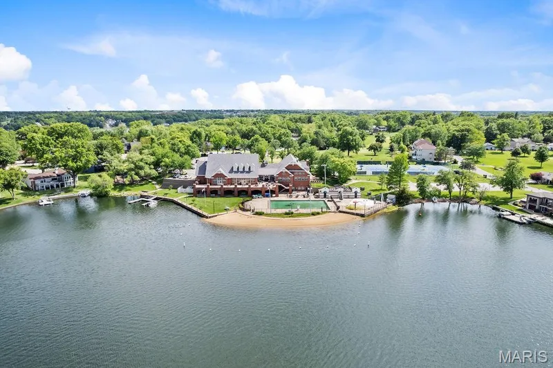Aerial view of Lake St. Louise ("Little Lake") and the LSL Community Association Clubhouse and Beach. — 1016 Lafayette Place, Lake St. Louis, MO 63367