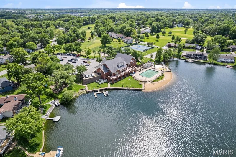 Aerial view of Lake St. Louise ("Little Lake") and the LSL Community Association Clubhouse and Beach. — 1016 Lafayette Place, Lake St. Louis, MO 63367