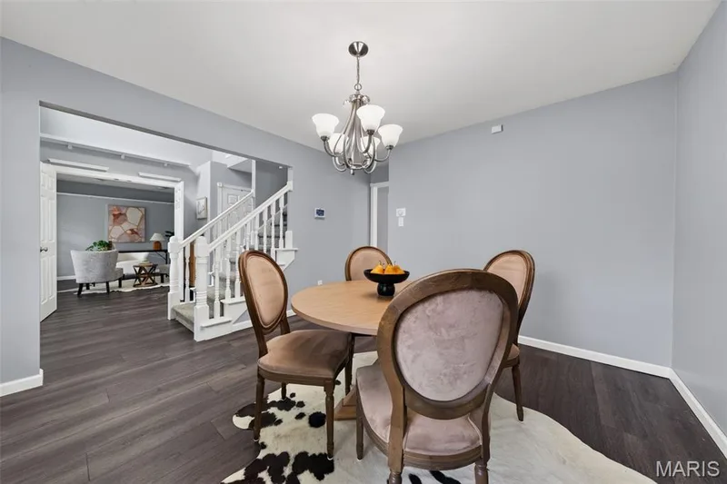 Dining area featuring LVP flooring. — 1016 Lafayette Place, Lake St. Louis, MO 63367