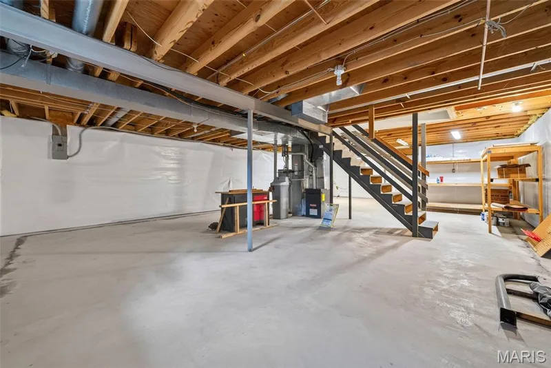 Preemptive basement waterproofing and finishing prep have already been completed, providing added value and a head start on future basement expansion. — 1016 Lafayette Place, Lake St. Louis, MO 63367