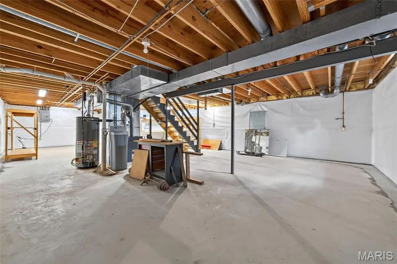 Preemptive basement waterproofing and finishing prep have already been completed, providing added value and a head start on future basement expansion. — 1016 Lafayette Place, Lake St. Louis, MO 63367