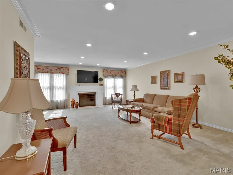 Another view of the living room. — 208 Ambridge Court #206, Chesterfield, MO 63017