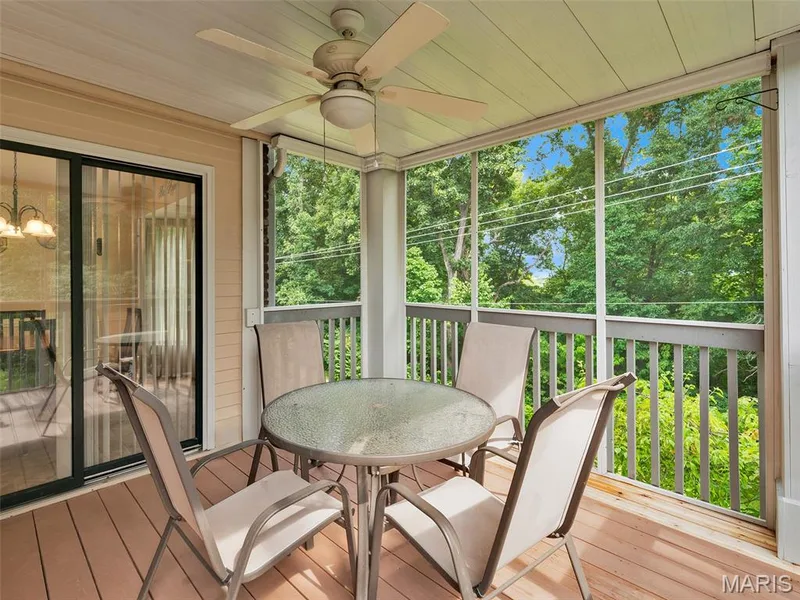 Look at this beautiful screen porch, right off the breakfast room!  What an incredible, private retreat! — 208 Ambridge Court #206, Chesterfield, MO 63017