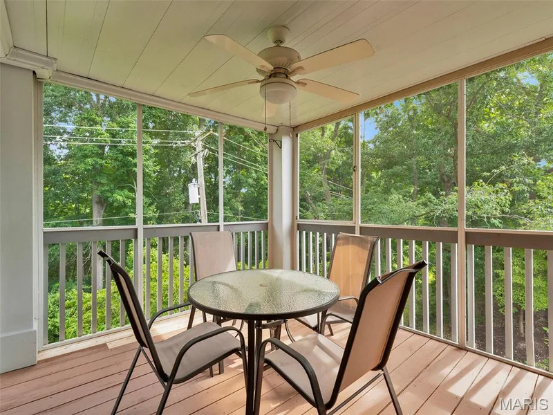 Screen porch just off the kitchen, perfect for fresh air, rest and relaxation. — 208 Ambridge Court #206, Chesterfield, MO 63017