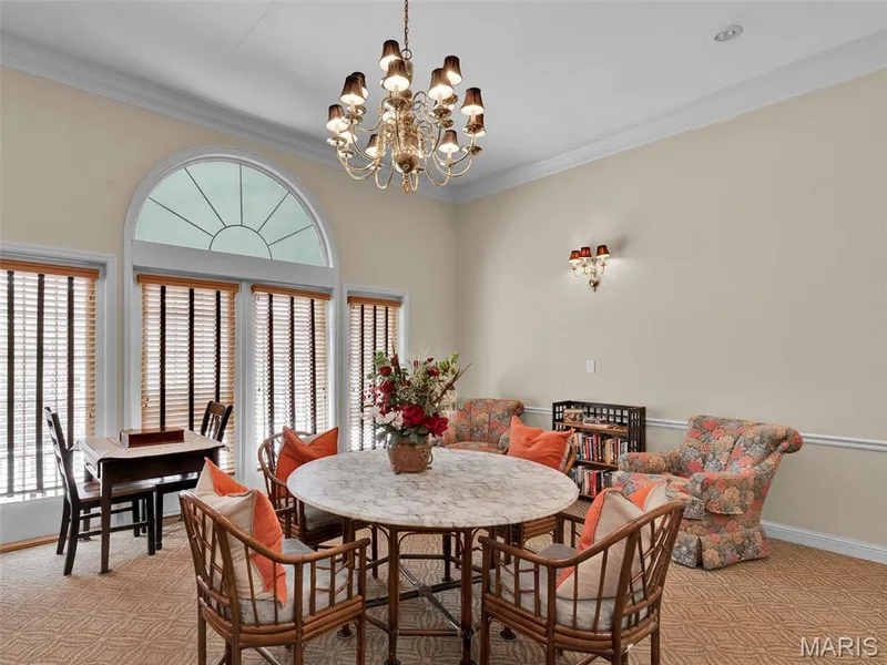 Take the elevator or the elegant stairway to the third floor and find this great game room, perfect for gathering, playing cards, catching up! — 208 Ambridge Court #206, Chesterfield, MO 63017