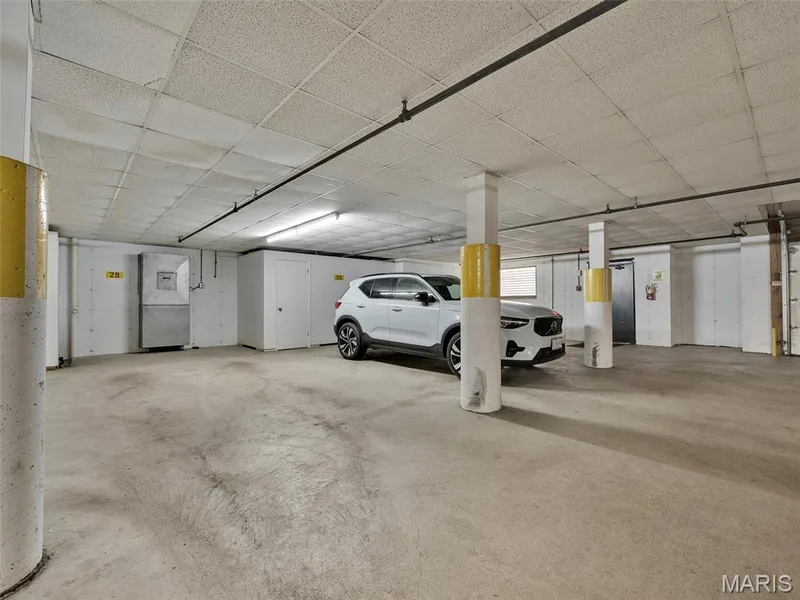 A dedicated parking space is available for Condo #206.  Clean, secure, underground parking with an elevator, for wonderful convenience. — 208 Ambridge Court #206, Chesterfield, MO 63017