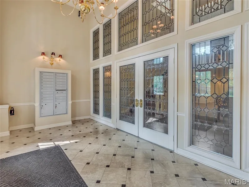 A lovely, well maintained and secure lobby to get your mail and packages, and where your visitors can call you to get buzzed in when they arrive. — 208 Ambridge Court #206, Chesterfield, MO 63017