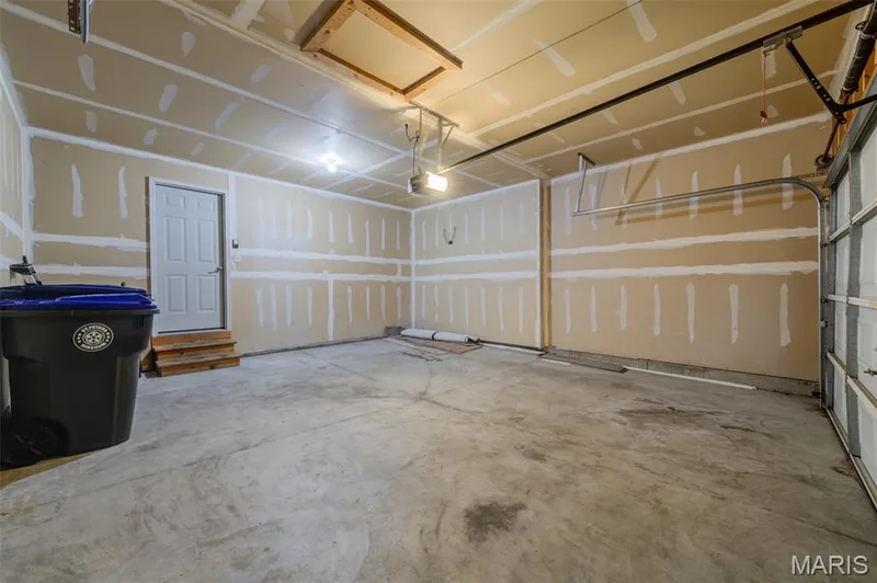 Drywalled walls in the garage — 1844 Sterling Oaks Drive, St Peters, MO 63376