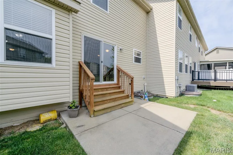 Patio out back w/window sets down — 1844 Sterling Oaks Drive, St Peters, MO 63376