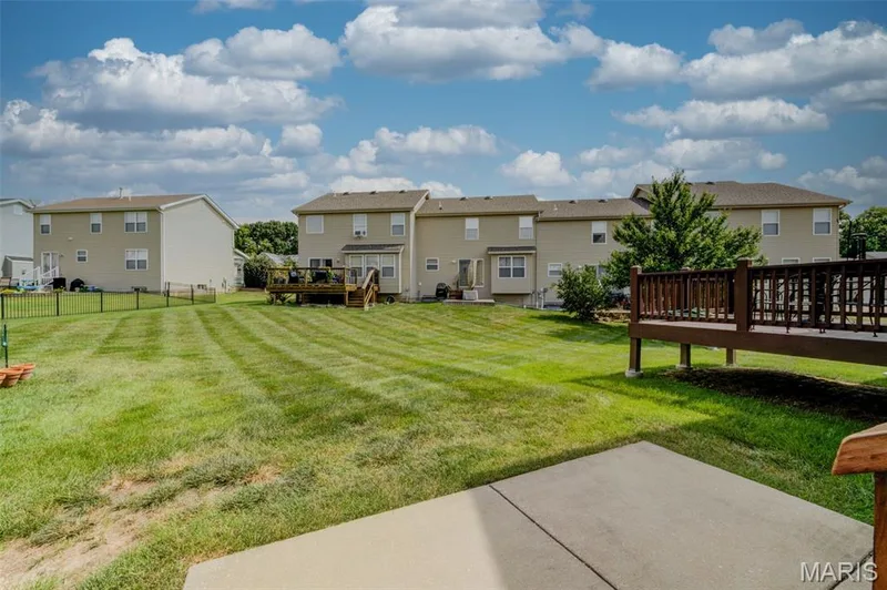 Large patio with enough room for a grill and sitting — 1844 Sterling Oaks Drive, St Peters, MO 63376